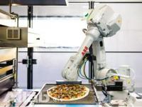 这是一份机器人做的披萨 你会不会吃的津津有味？